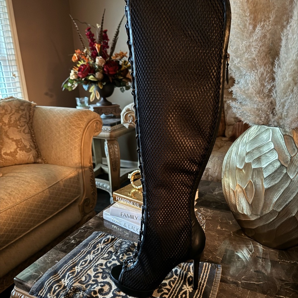 Jennifer Lopez  over-the- knee boots